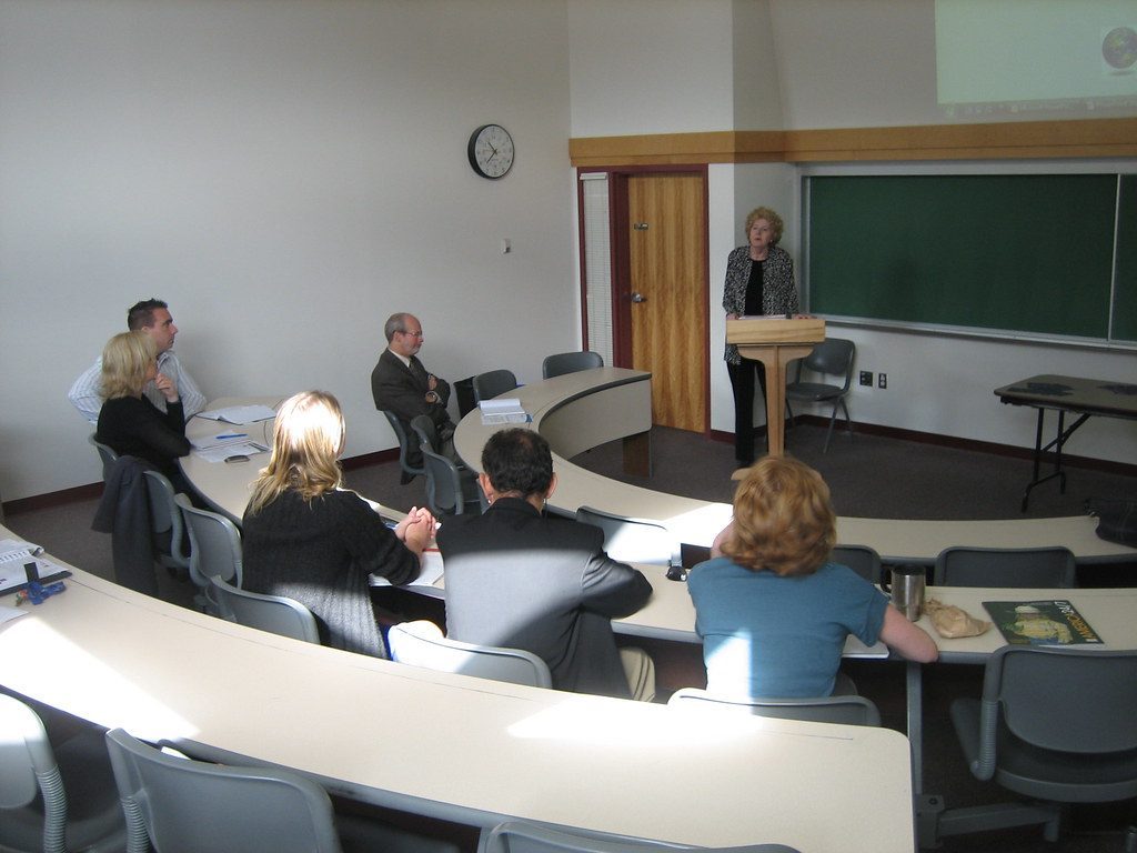 An audience seated at a conference